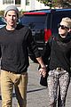 miley-holding