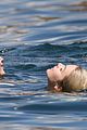 bella-thorne-yellow-bikini-lake-como-with-benjamin-mascolo