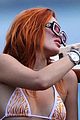 bella-thorne-yellow-bikini-lake-como-with-benjamin-mascolo