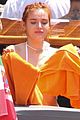 bella-thorne-yellow-bikini-lake-como-with-benjamin-mascolo