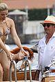 bella-thorne-yellow-bikini-lake-como-with-benjamin-mascolo