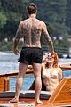 bella-thorne-yellow-bikini-lake-como-with-benjamin-mascolo