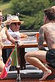 bella-thorne-yellow-bikini-lake-como-with-benjamin-mascolo
