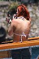 bella-thorne-yellow-bikini-lake-como-with-benjamin-mascolo