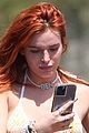 bella-thorne-yellow-bikini-lake-como-with-benjamin-mascolo