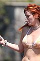 bella-thorne-yellow-bikini-lake-como-with-benjamin-mascolo