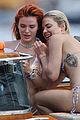 bella-thorne-yellow-bikini-lake-como-with-benjamin-mascolo