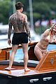 bella-thorne-yellow-bikini-lake-como-with-benjamin-mascolo