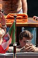 bella-thorne-yellow-bikini-lake-como-with-benjamin-mascolo
