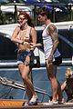 bella-thorne-yellow-bikini-lake-como-with-benjamin-mascolo