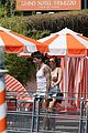 bella-thorne-yellow-bikini-lake-como-with-benjamin-mascolo