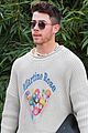 nick-jonas-business-meeting-omega-event