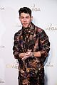 nick-jonas-business-meeting-omega-event