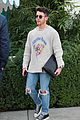 nick-jonas-business-meeting-omega-event
