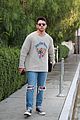 nick-jonas-business-meeting-omega-event