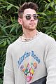 nick-jonas-business-meeting-omega-event